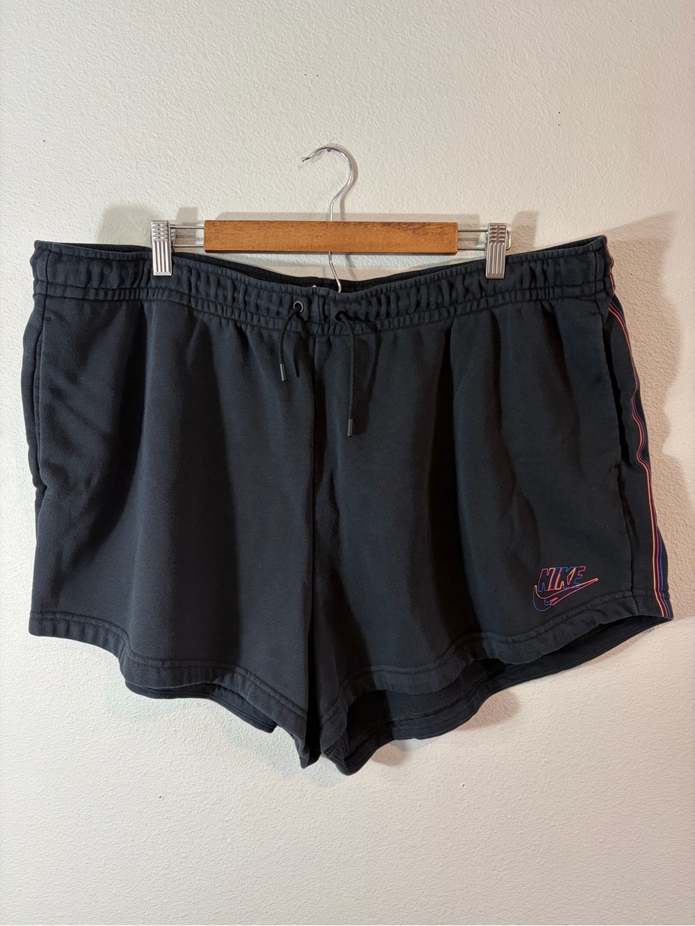 Nike Black Athletic Shorts with Pink Trim and Logo